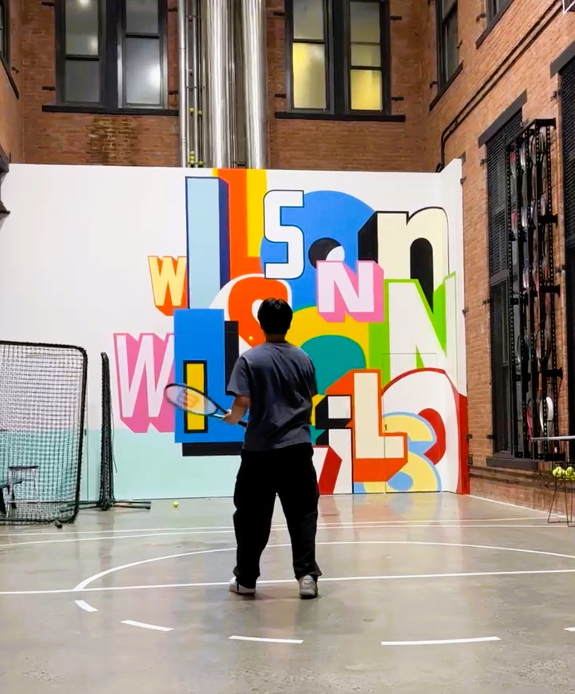 Playing tennis at SoHo Wilson Store